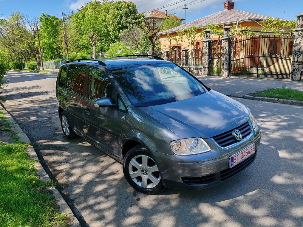 Vw Touran 2007 navi 7 locuri motor 1.9 recent adus