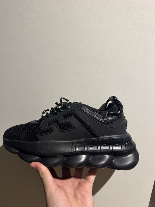 Versace chain resction