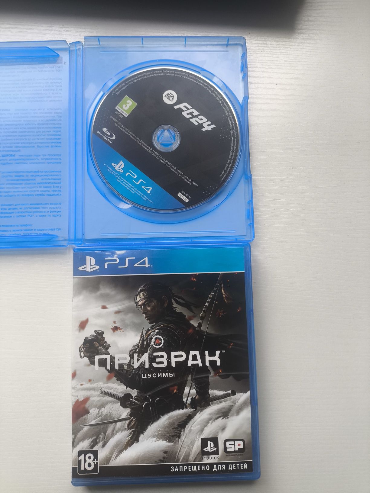 Продам диски на пс4 призрак цусимы и фк24