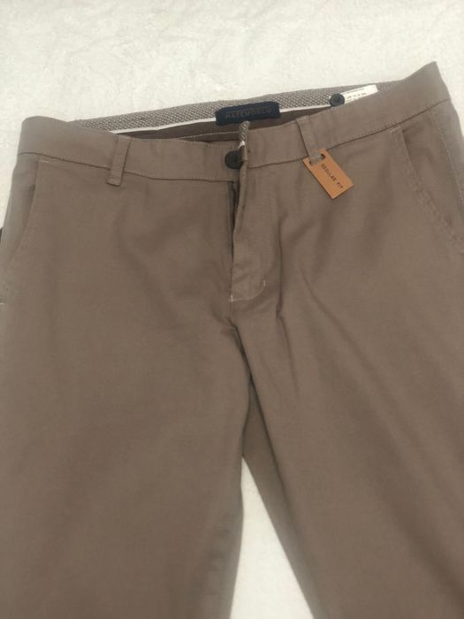 Vand pantaloni barbati