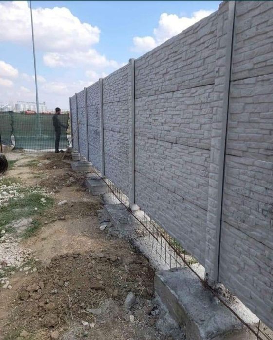 Executam garduri si porti