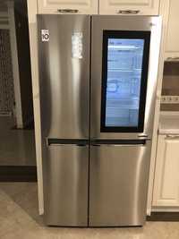 Холодильник серый Samsung.
