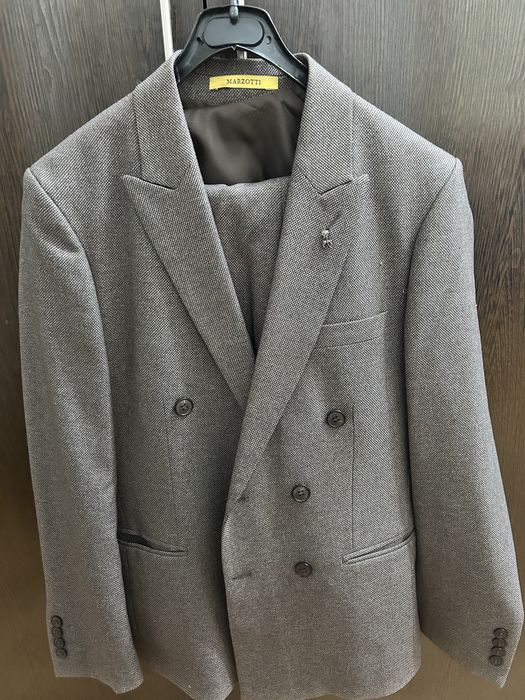 Продам коричневый мужской костюм