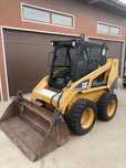 Mini incarcator Caterpillar 216