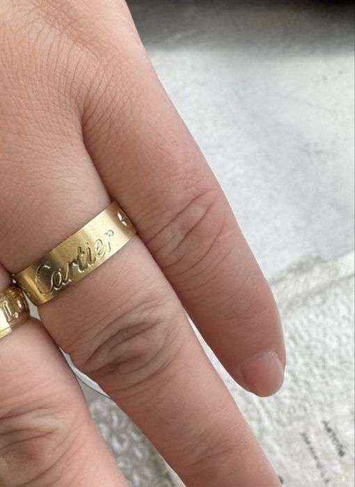 Золото Кольцо сатылады под бренд Cartier
