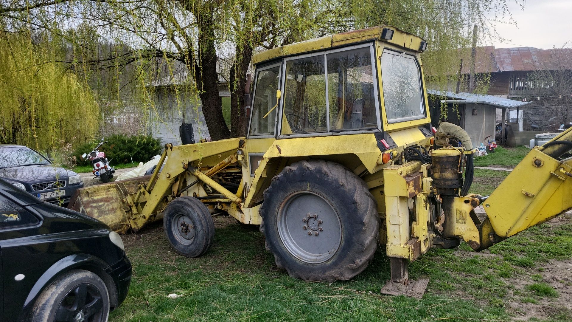 Buldoexcavator MF,schimb cu duba xxl sau autorulota.