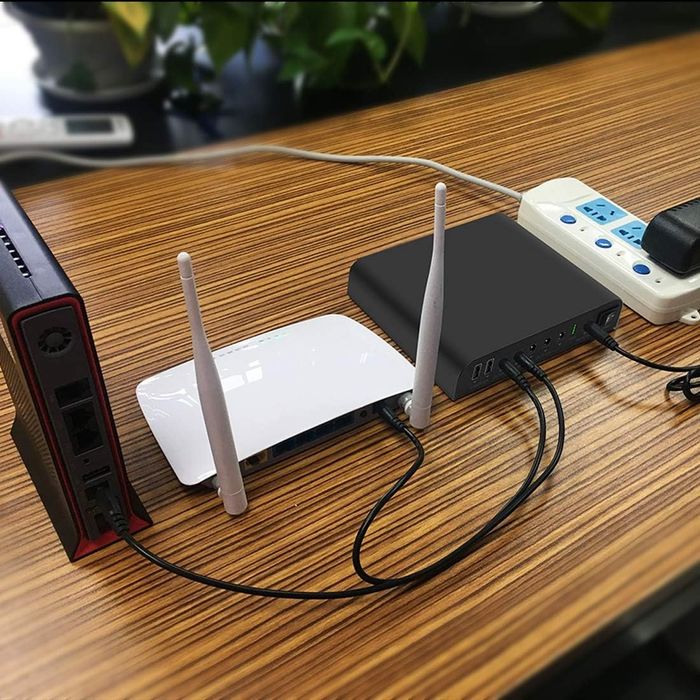 Мини UPS 27000mAh, 12V, 9V, 5V за рутери, видеонаблюдение, фотоапарати