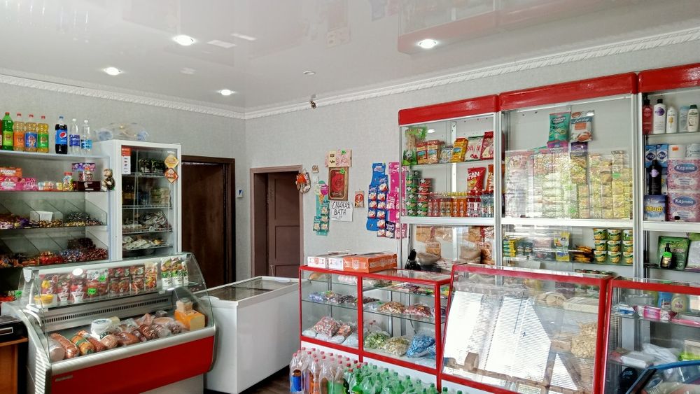 Шпальный дом с магазином