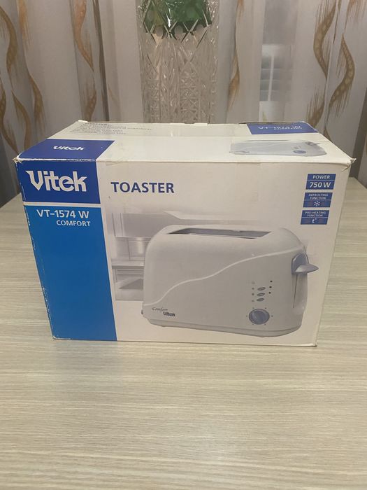 Продам новый тостер