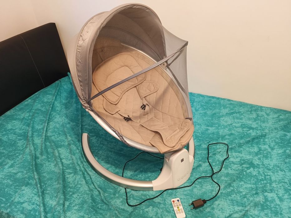 Leagan electric multifunctional pentru bebelusi