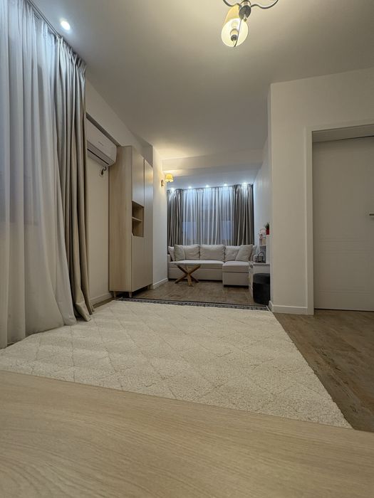 Apartament 2 camere modern, complet utilat si mobilat+loc de parcare