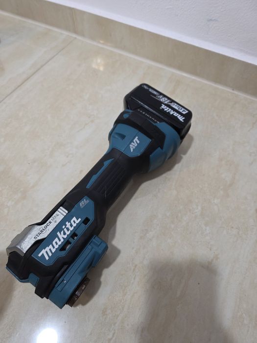 Multifuncțională multicuter Makita DTM 52