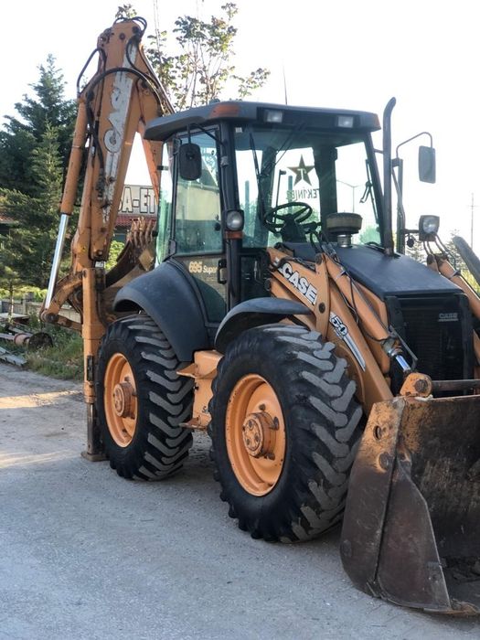 Услуги  экскаватора-погрузчика(петушок).