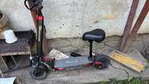 Trotinete electrică cu scaun