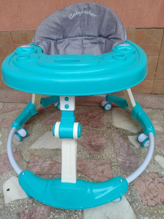 Premergător copii , reglabil pe înălțime , folosit foarte puțin