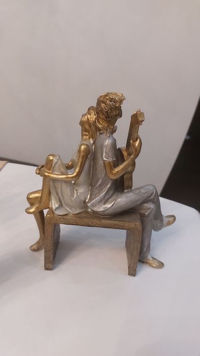 Декоративна фигура китаристист и момиче