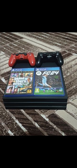 PS 4 PRO 1TB doua manete plus două jocuri
