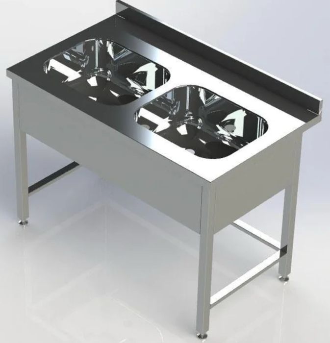 Стол с двумя раковинами из нержавеющей стали.