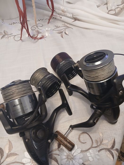 Vând două mulinete Okuma Longbow