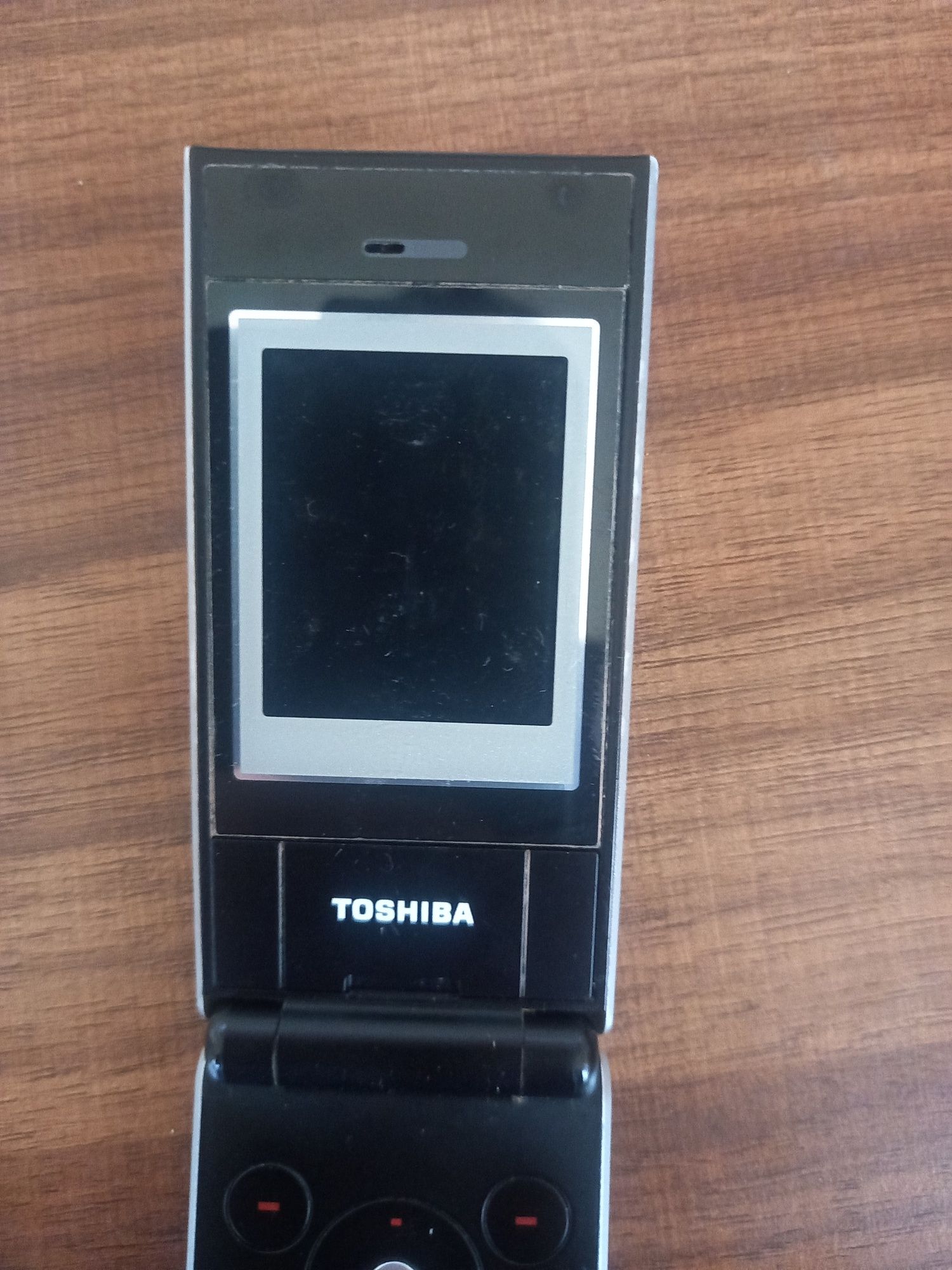 Телефон бижу Toshiba