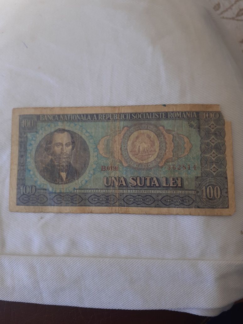Vind bacnota de 100.lei.cu 200.ron
