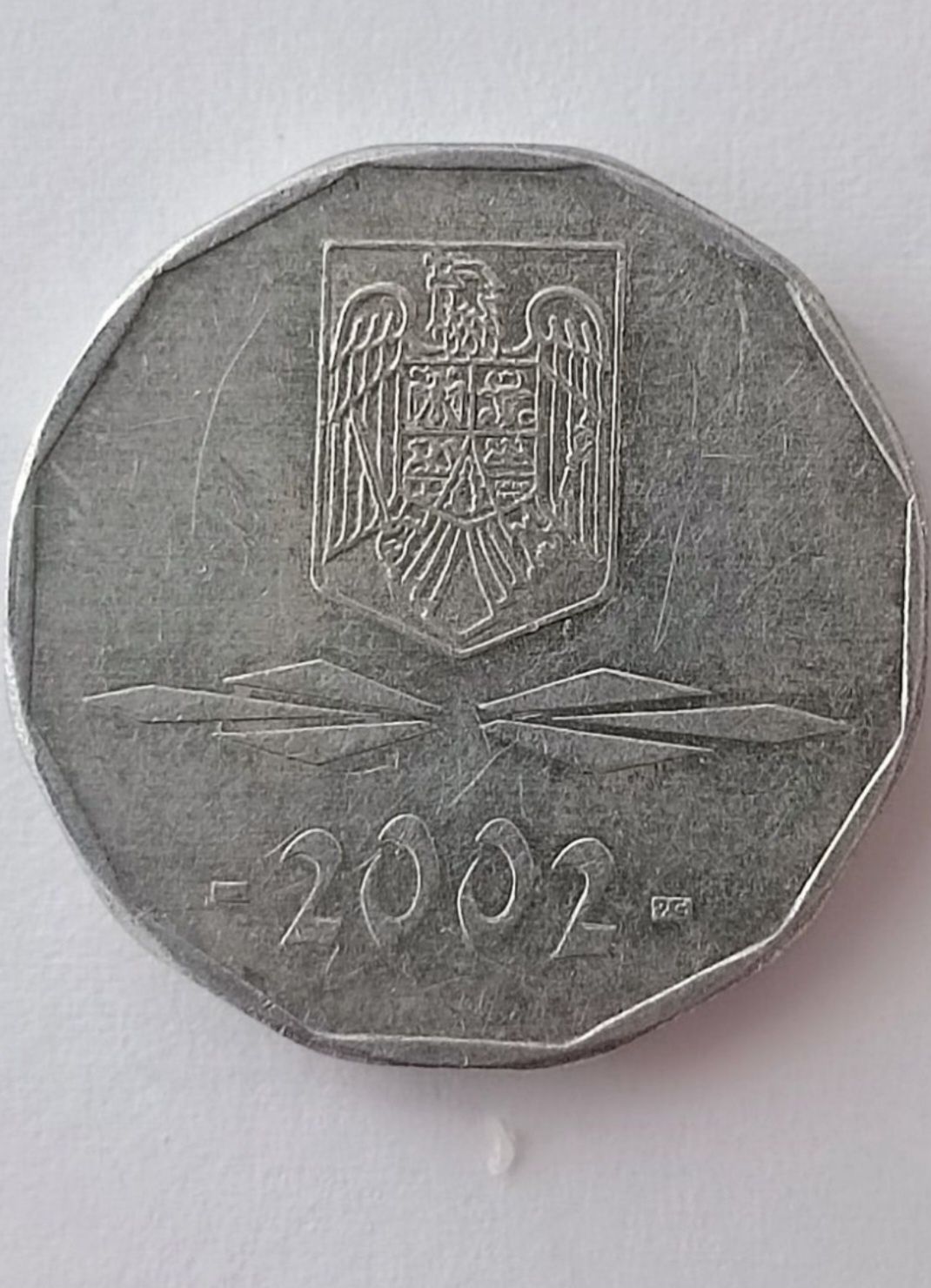 moneda 5000 lei anul 2002.