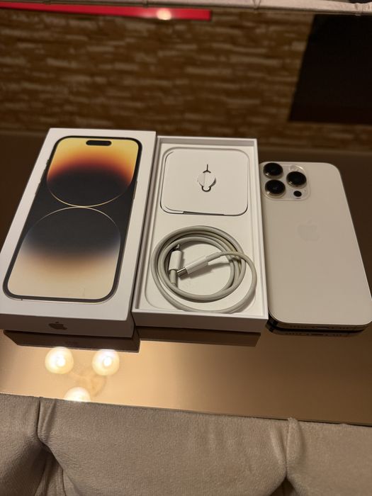 - IPHONE -14-PRO GOD/128 gb,full box,battery health 85%