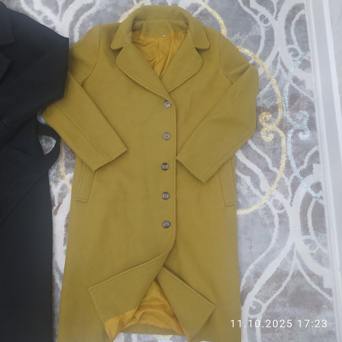 Пальто и куртки.