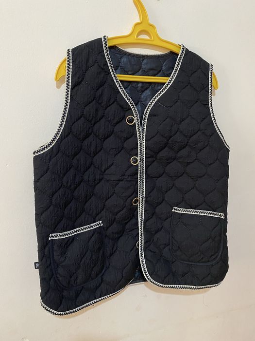 Жилетка  новая  продам .