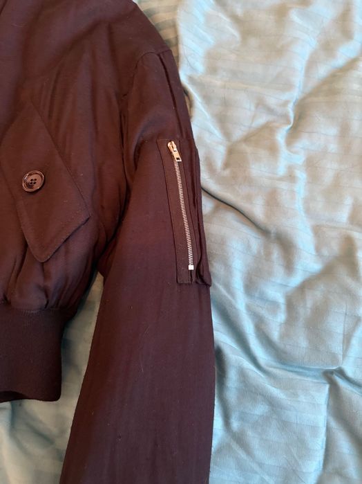 Bomber captusit pana in talie Miu Miu