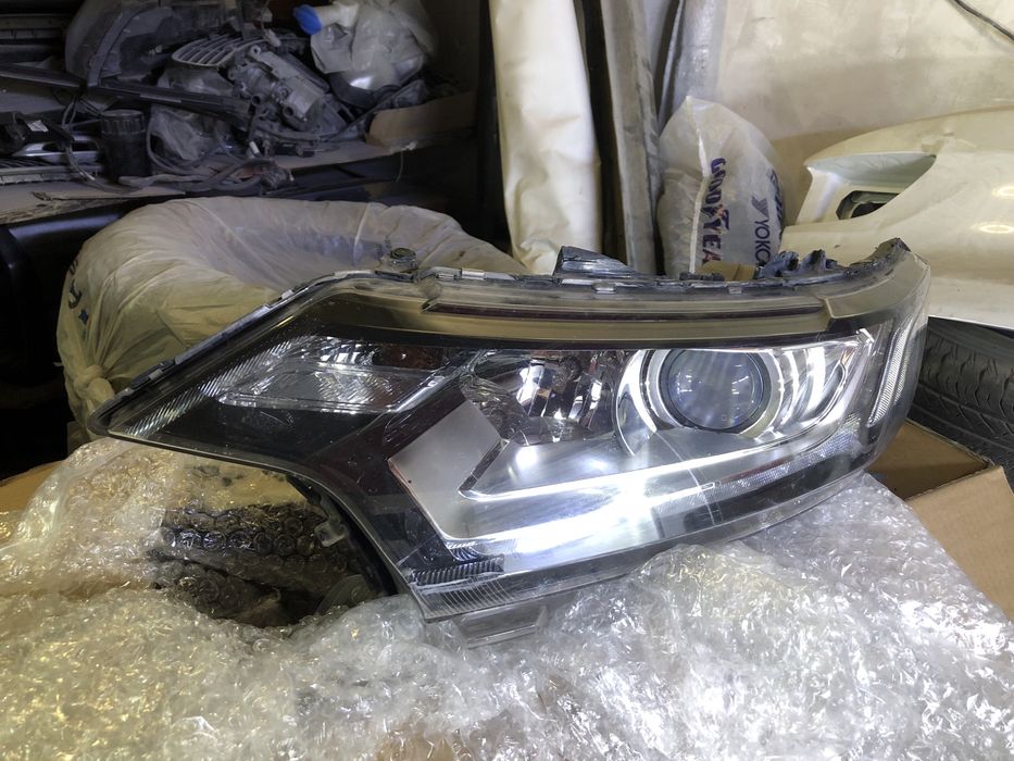 Фара левая мутцубиси