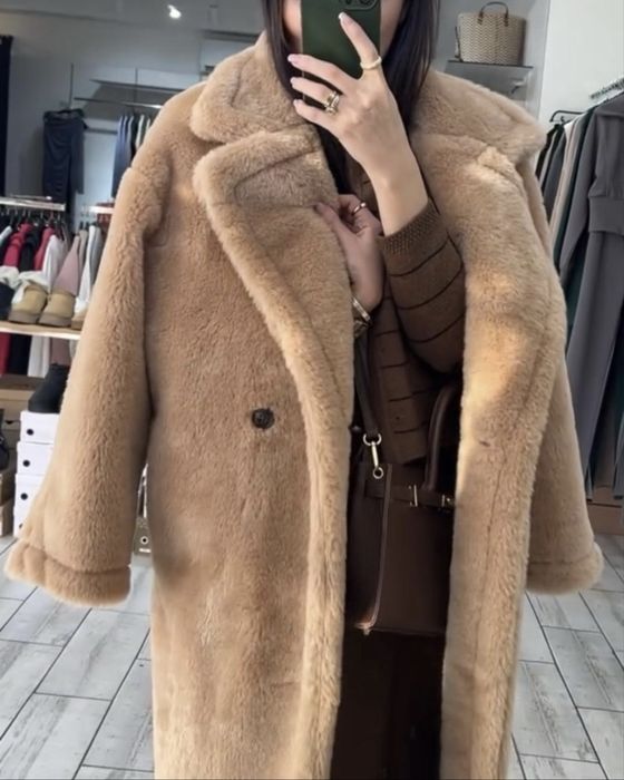 Шубка легкая в отличном состоянии