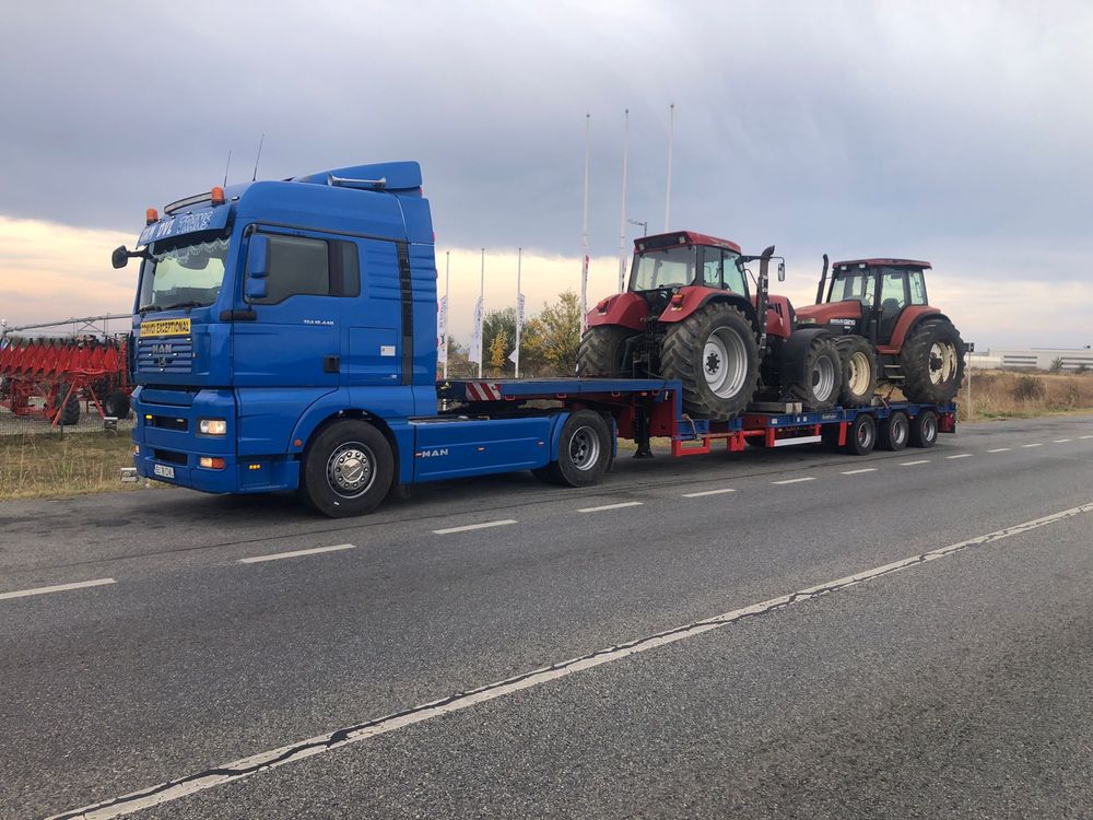 Transport utilaje agricole /industriale inchiriez trailer platforma