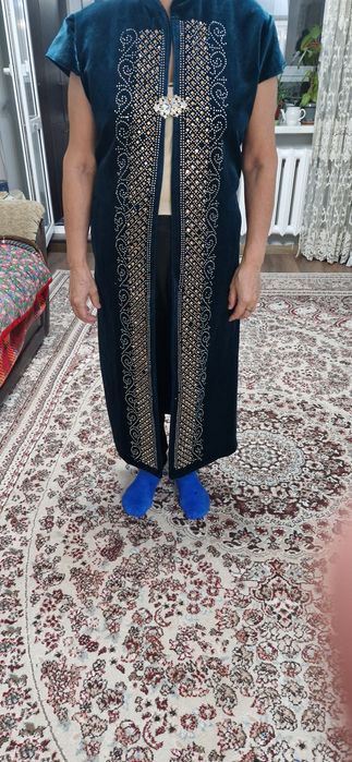 Продам Қамзол Кпжнкей зеленого цвета длинный 52.54.размер.