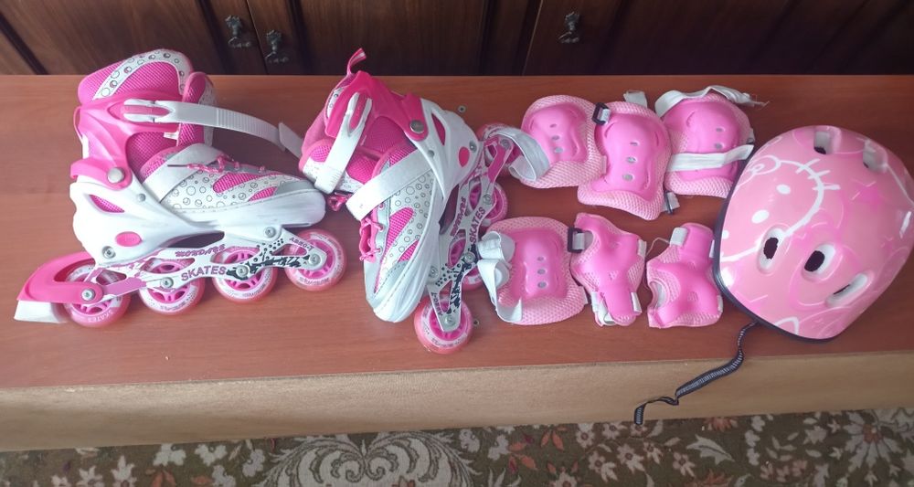 Коньки роликовые