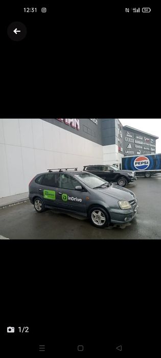 Продается машина Nissan Almera Tino