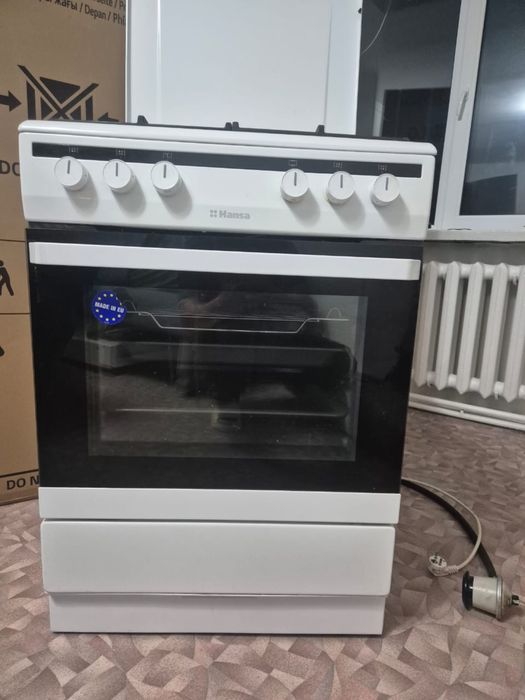 Продам газовую плиту с электрической духовкой. В идеальном состоянии.