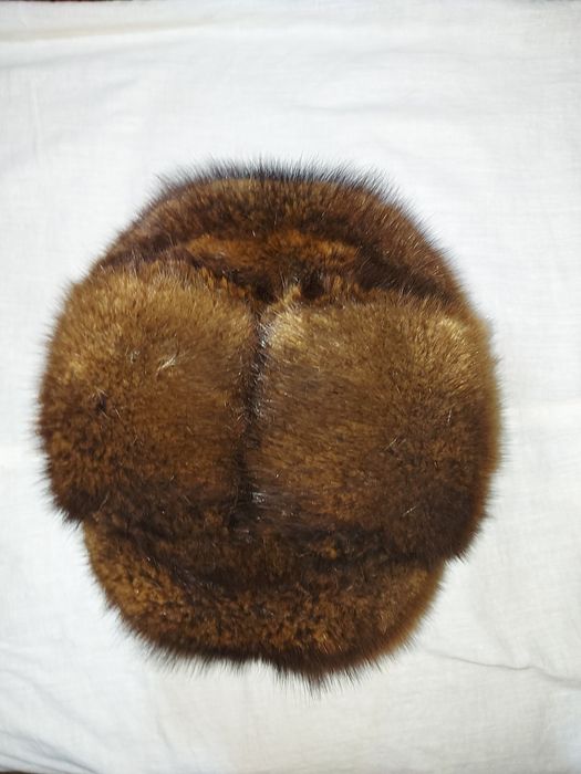 Порлдам   шапку  норкуваю  57  размер