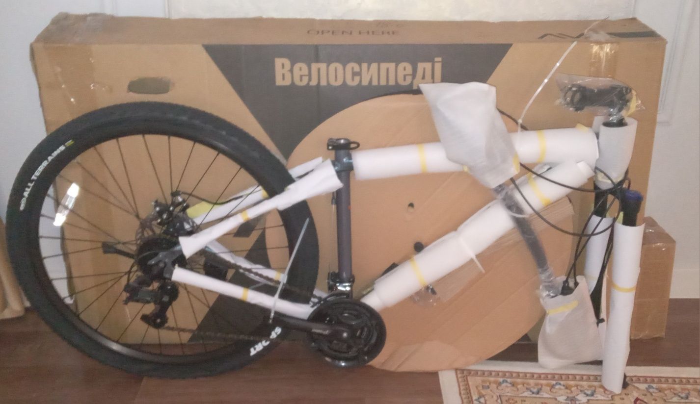 Новый скоростной велосипед в упаковке
