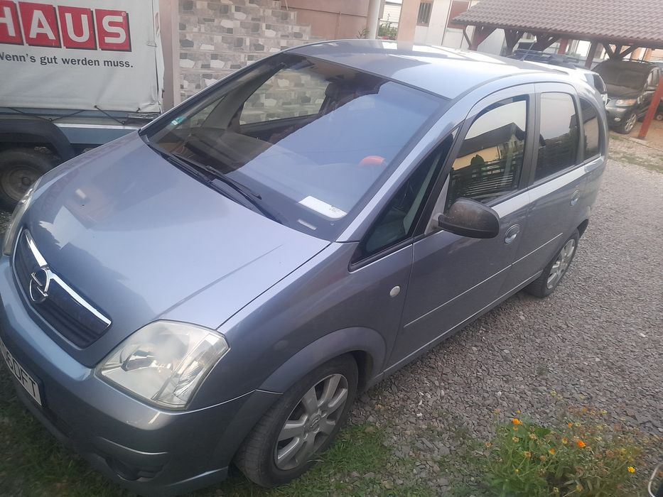 Schimb 2 mașini santa fe jeep 4x4 și opel meriva