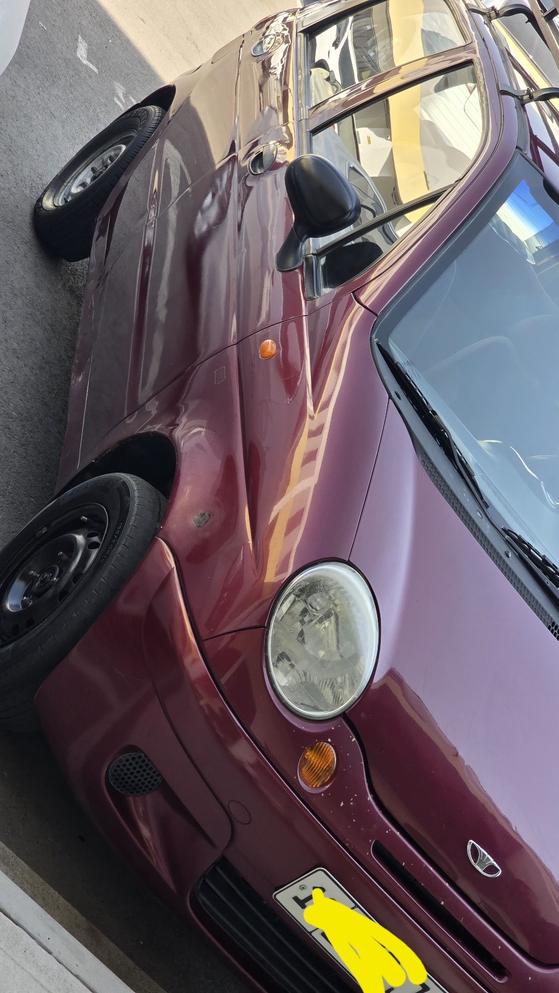 Matiz  kraskasi petnolari  bor Umar yoq