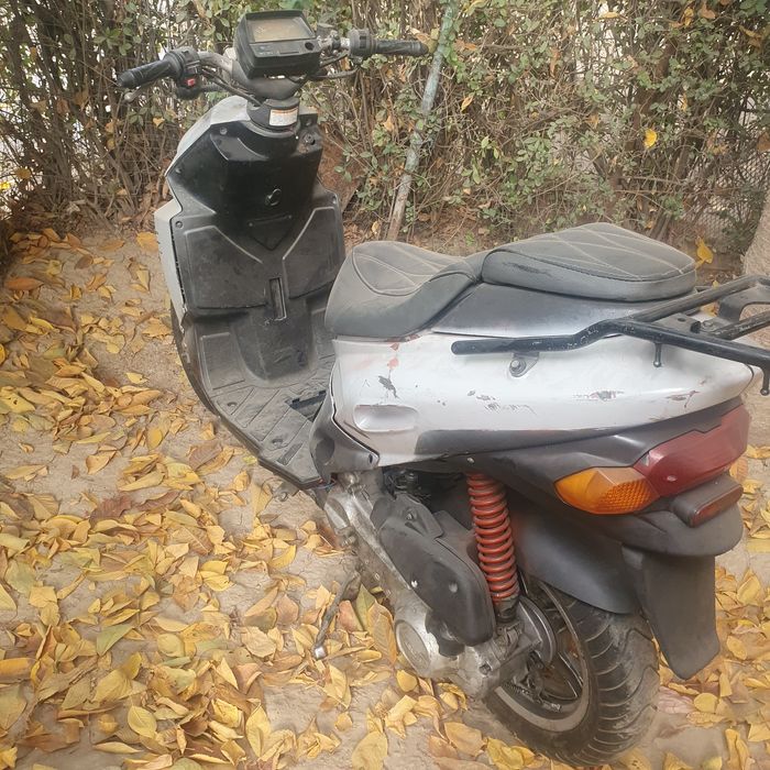 Скутер Daelim A Four