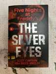 Книга The silver eyes