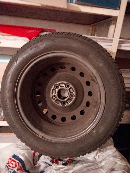 Set 4 anvelope iarnă Bridgestone 215/55 R16 97H + jante oțel