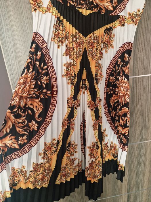 Rochie plisata vaporoasa