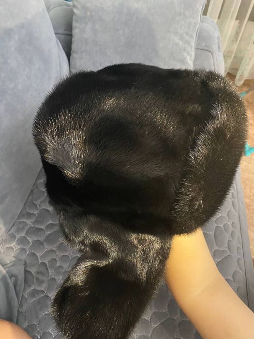 Продам норкавую шапку ушанку алмазно чёрного цвета в отличном состояни