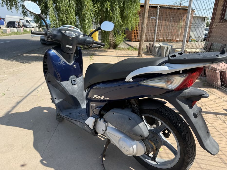 Honda sh 125i se conduce cu categoria B