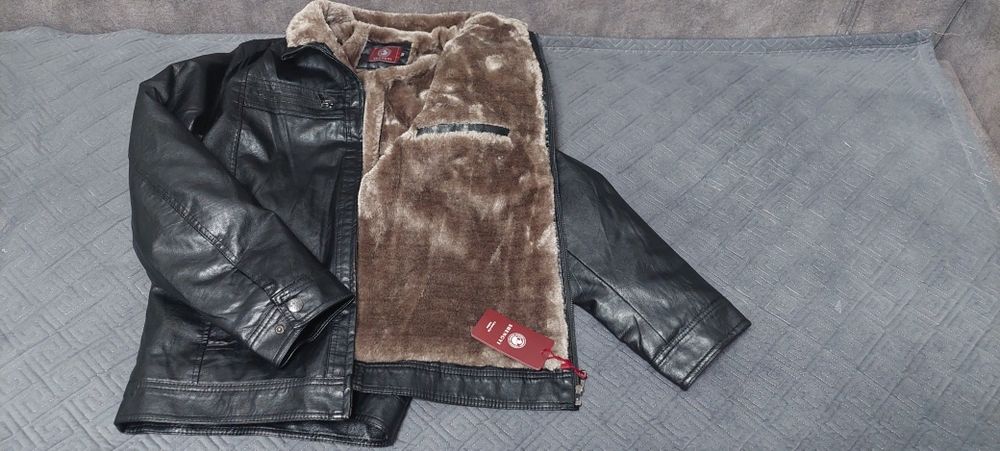 Продам новую кожаную куртку.