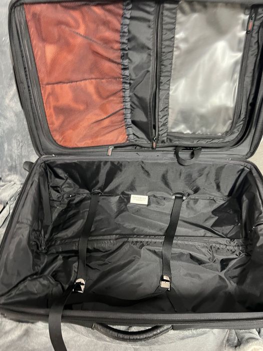 Trollere upright extensibil Samsonite si Buxton