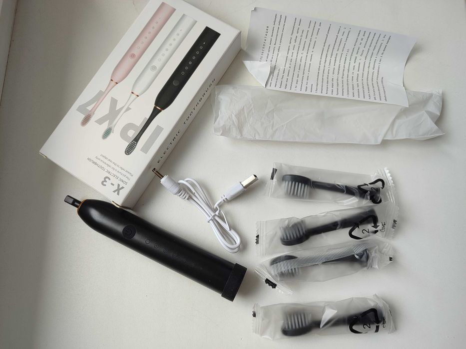 Продам новая зубная щётка с насадками для детей и взрослых